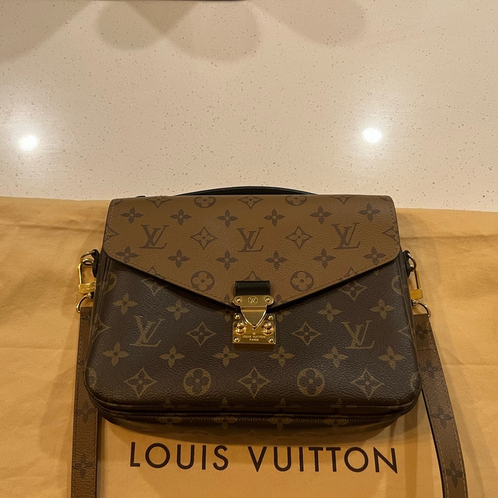 Lv crossbody with strap